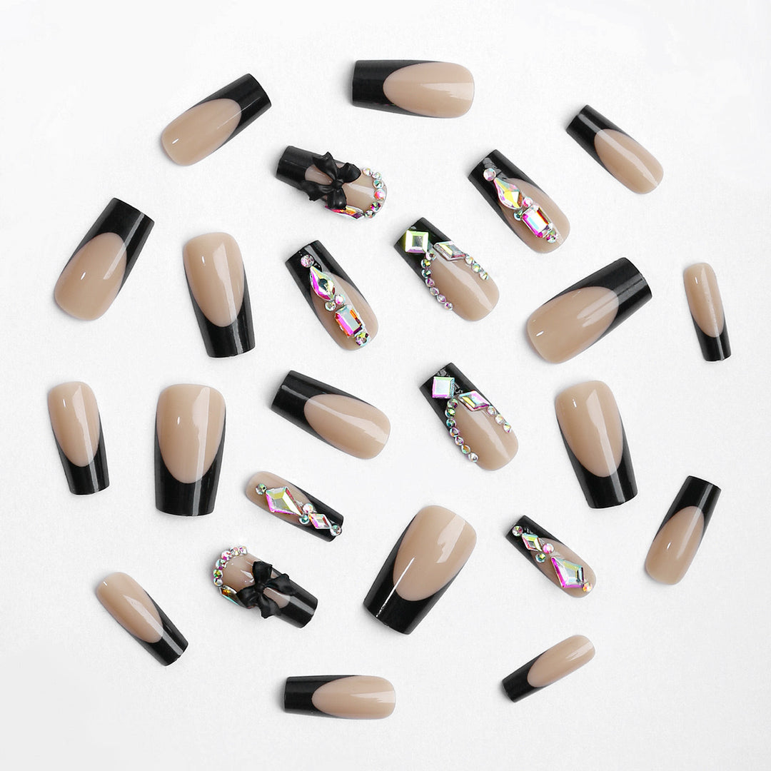 Glamorous artificial nail set with sparkling rhinestone and bow decorations Stornfield