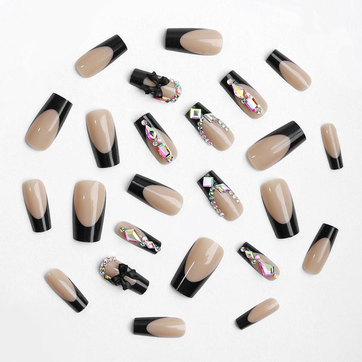Glamorous artificial nail set with sparkling rhinestone and bow decorations Stornfield