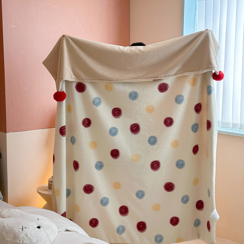 Reversible cuddly blanket made of teddy fleece and microfleece with floral pattern and fastening straps