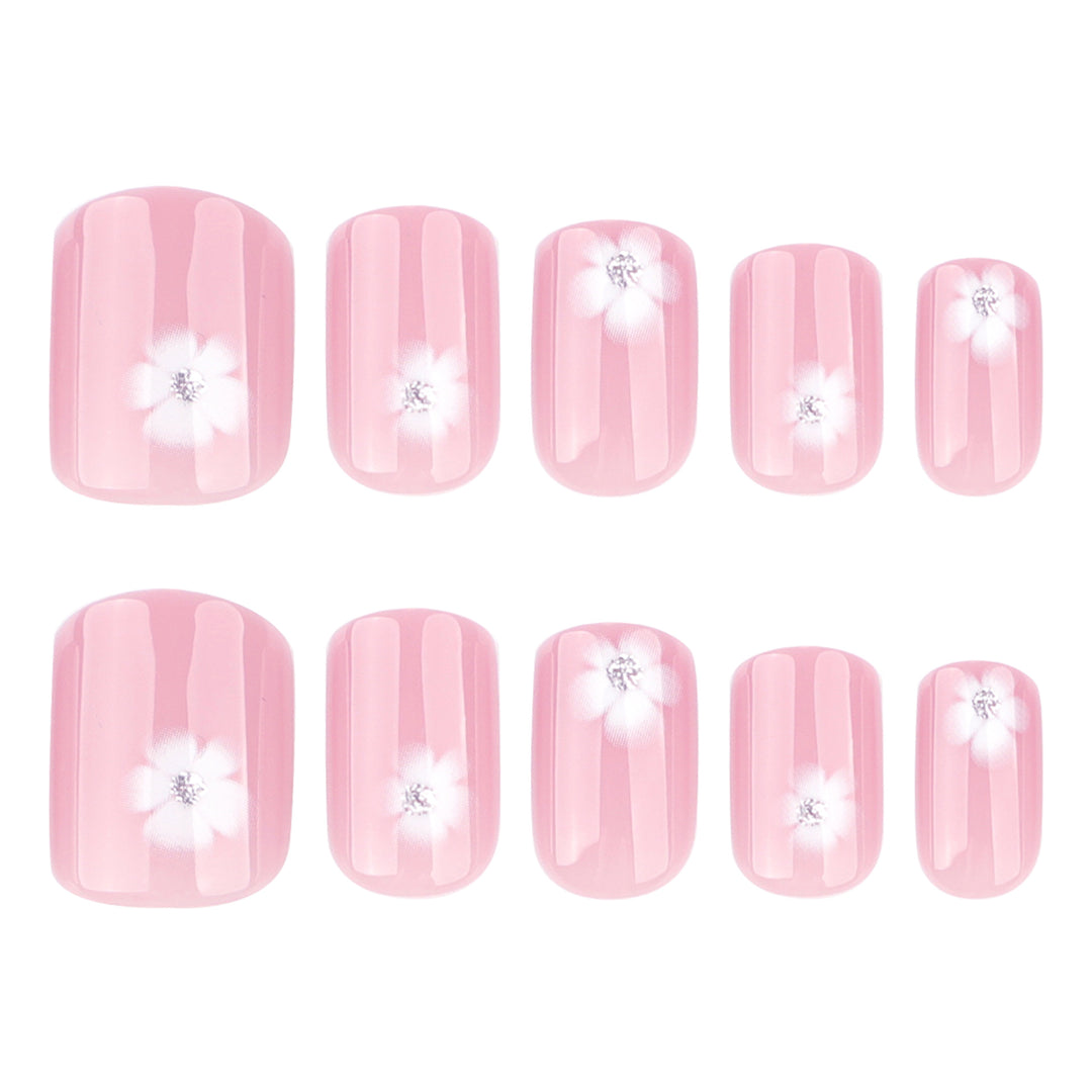 Elegant artificial nails with filigree floral motifs and glitter accents Stornfield