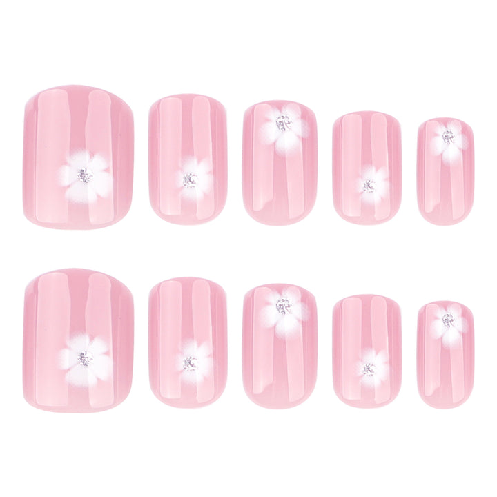 Elegant artificial nails with filigree floral motifs and glitter accents Stornfield