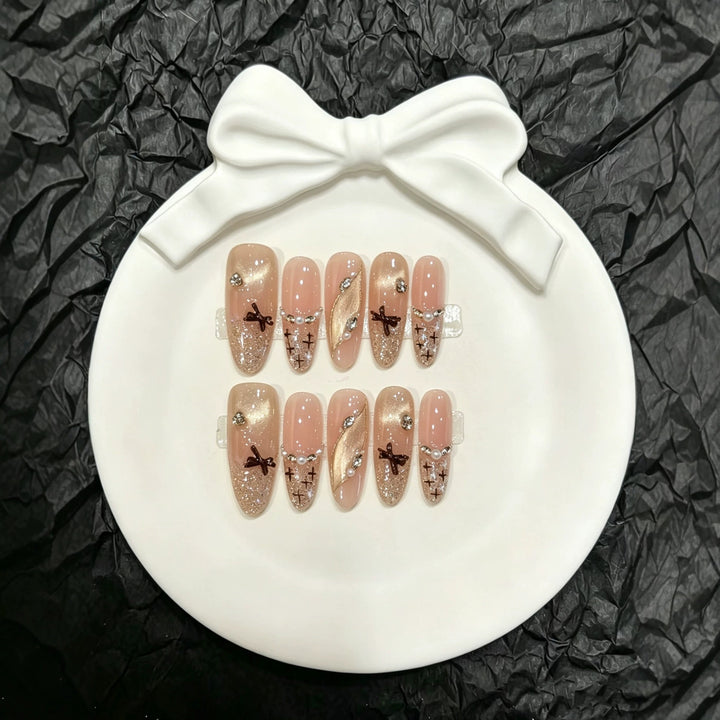 Decorative Press-On Nail Art Set with Glitter and Floral Accents  1791774296