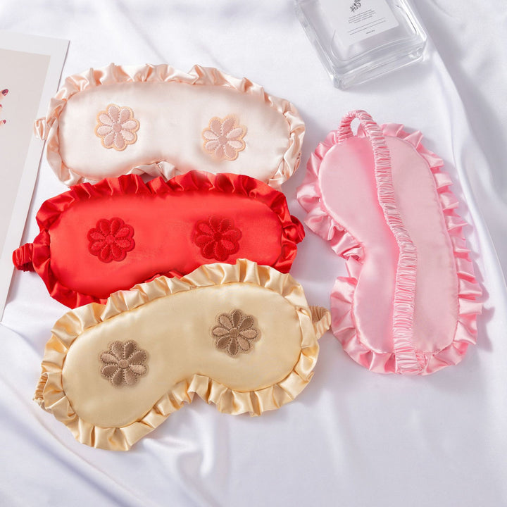 Women's embroidered satin sleep mask with gathered ruffled edge and soft padding Stornfield