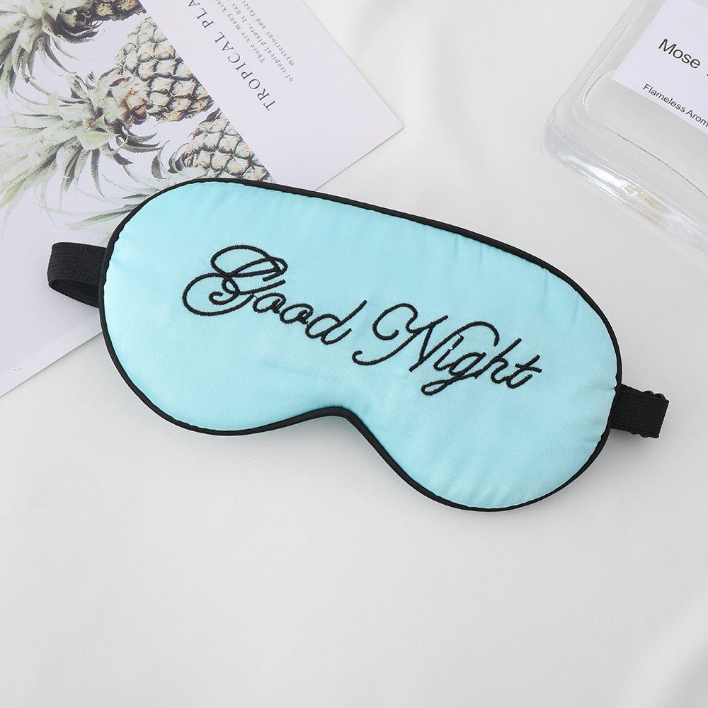 Unisex embroidered contoured sleep mask with decorative text embroidery and adjustable elastic band Stornfield