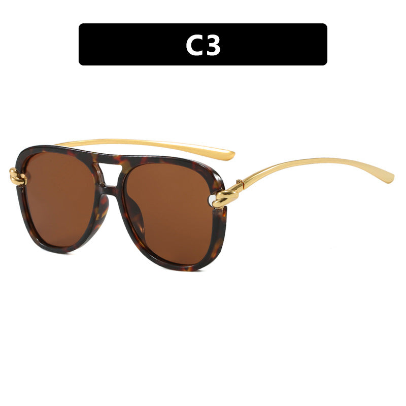 Women's sporty sunglasses with wide plastic frame and UV protection Stornfield