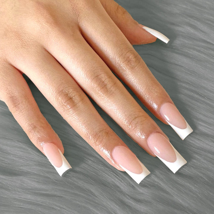 Creative acrylic nail set with elegant French-tip design Stornfield