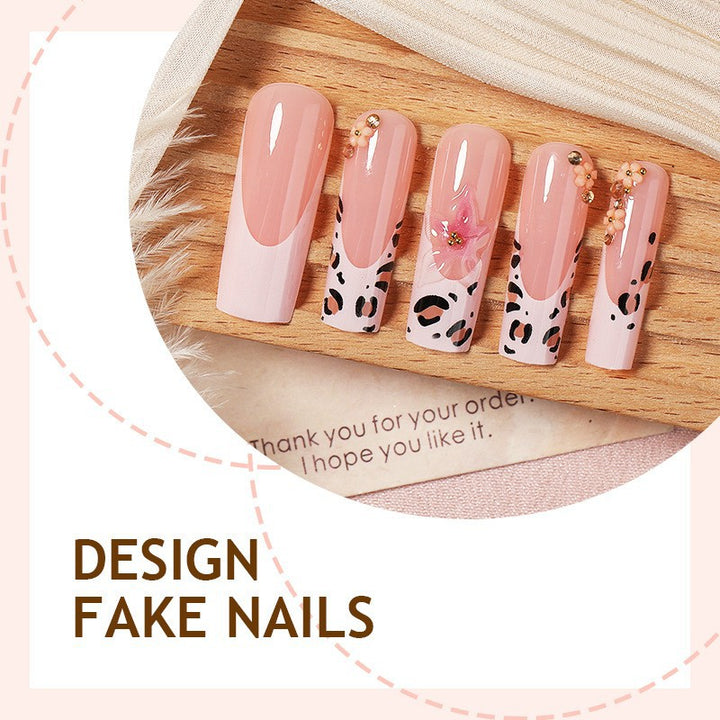 Artificial nail set with elegant flower and leopard accents Stornfield