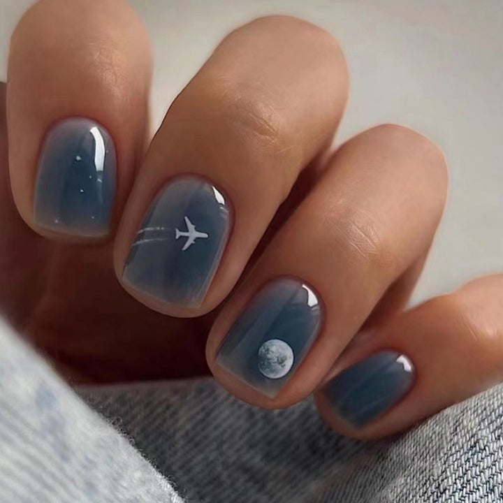 Artistic Travel-Themed Nail Extensions Stornfield