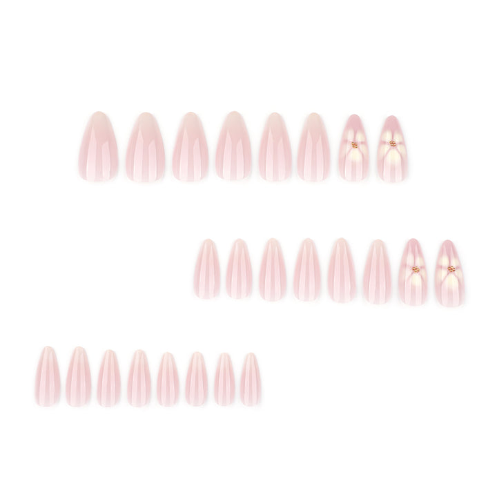 Elegant Stiletto Nails with Floral Accents Stornfield