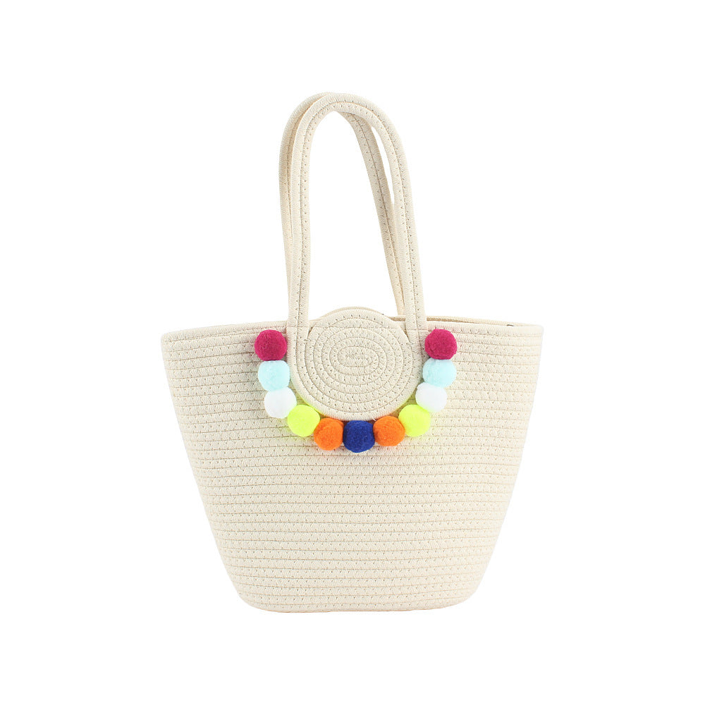 Beach bag with cheerful pom poms Stornfield