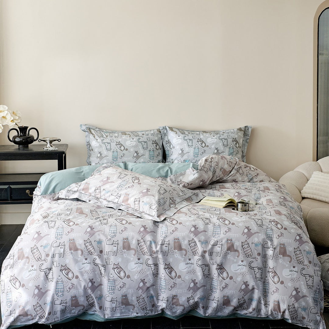 Reversible cotton satin bedding with delicate watercolor floral print and satin edge
