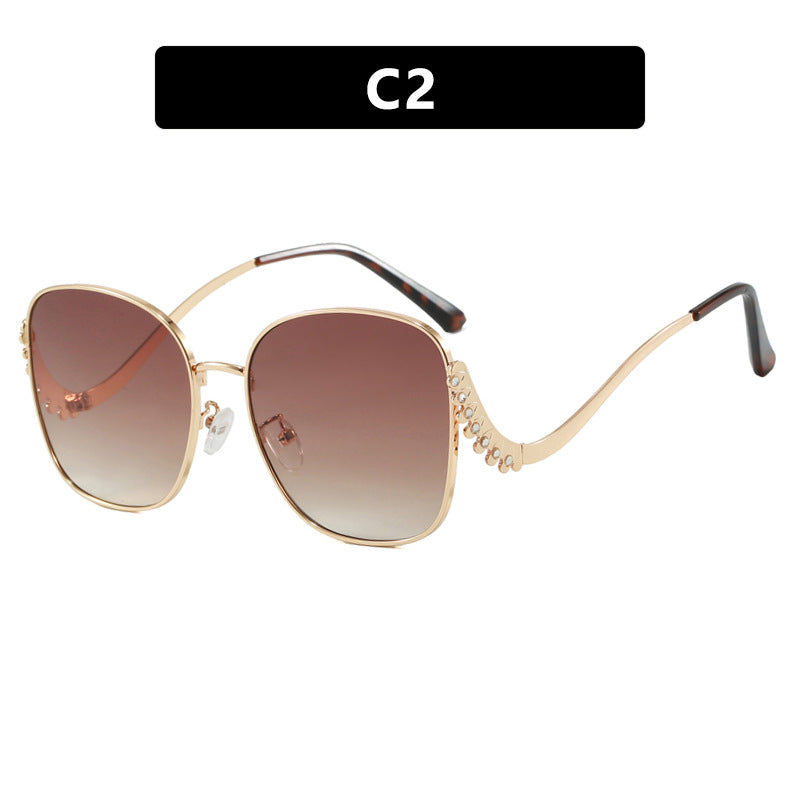 Women's striking sunglasses with sparkling appliqués Stornfield