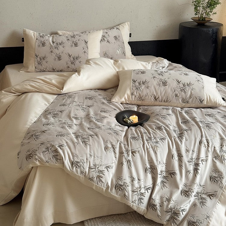Satin bedding set with fine bamboo leaf print and silky soft finish