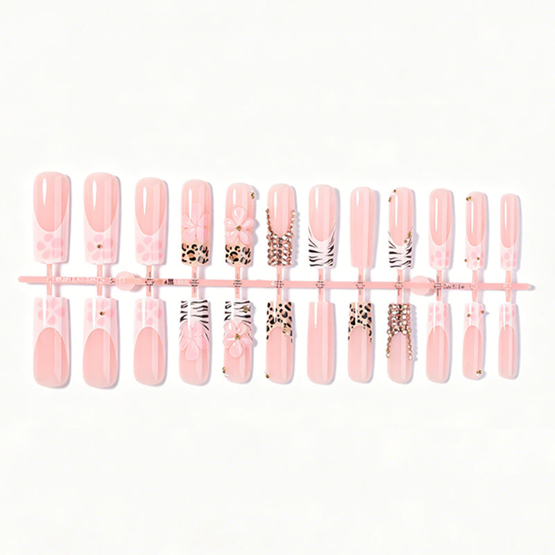 Artificial nail set with rhinestone accents Stornfield