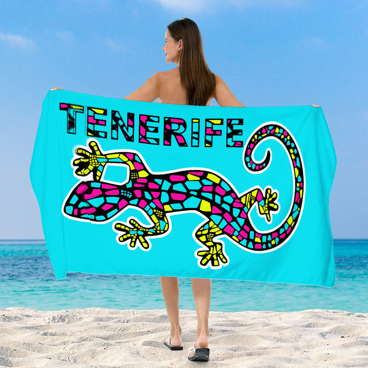 Beach towel with vibrant, colorful animal motif Stornfield