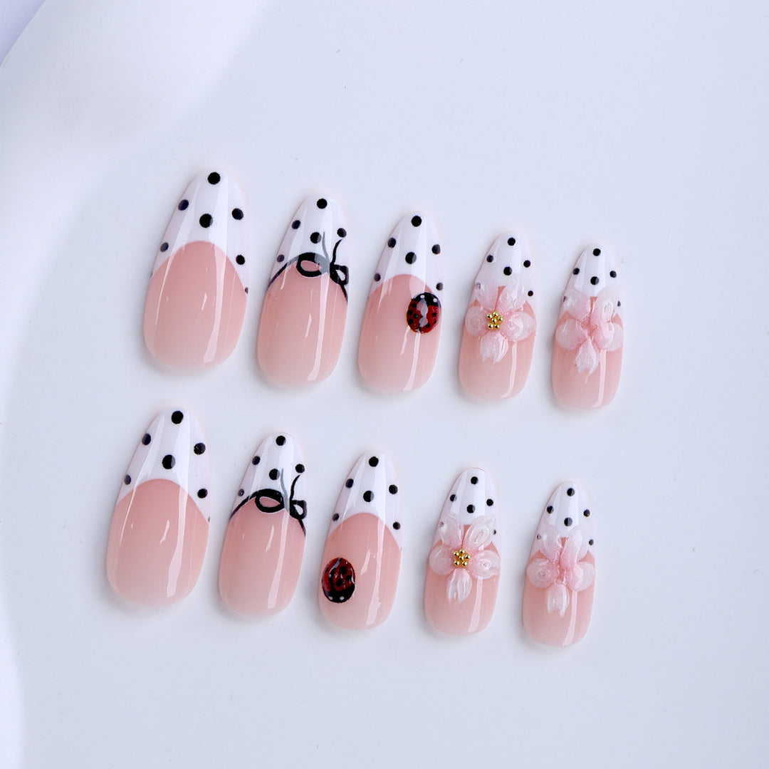Artificial nail art with floral and playful accents Stornfield