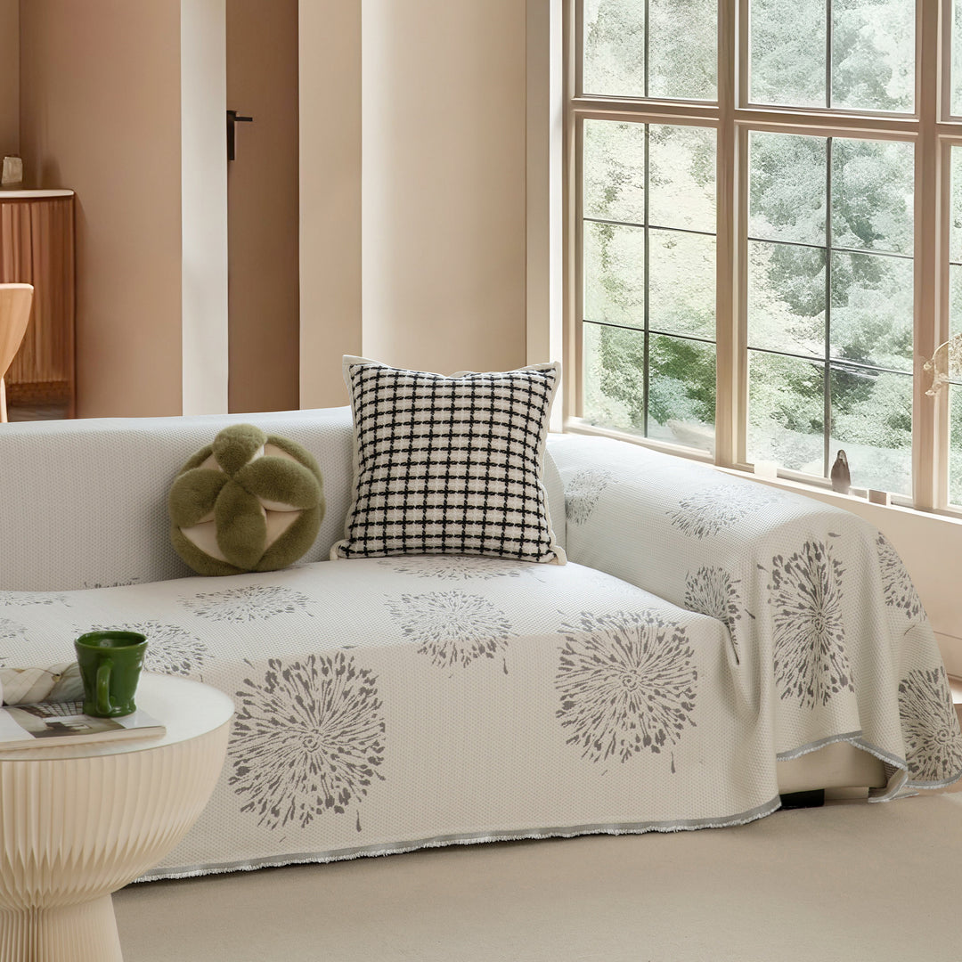 Elastic sofa cover made of jacquard cotton blend fabric with graphic relief pattern