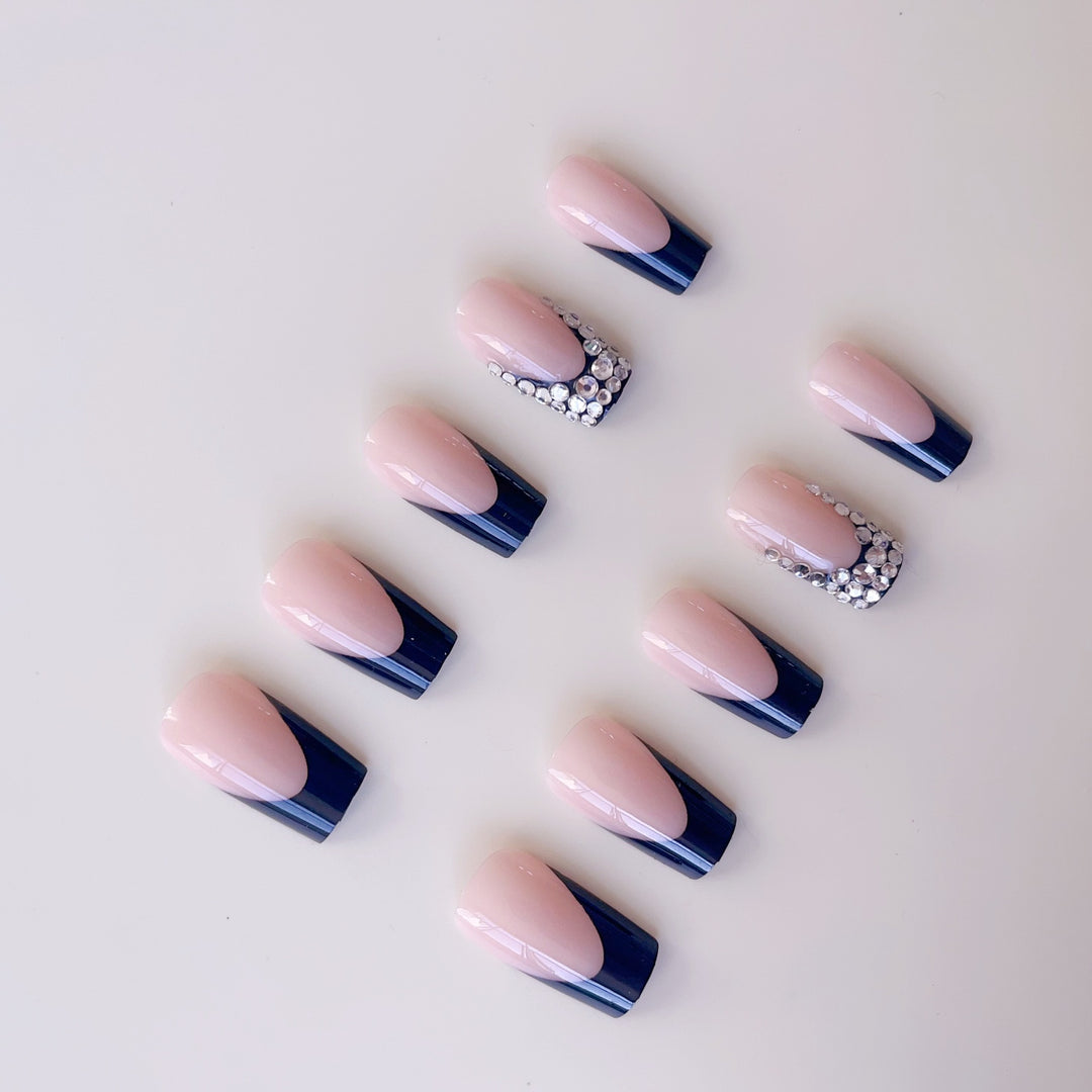 Artificial nail set with luxurious French design and sparkling rhinestone decorations Stornfield