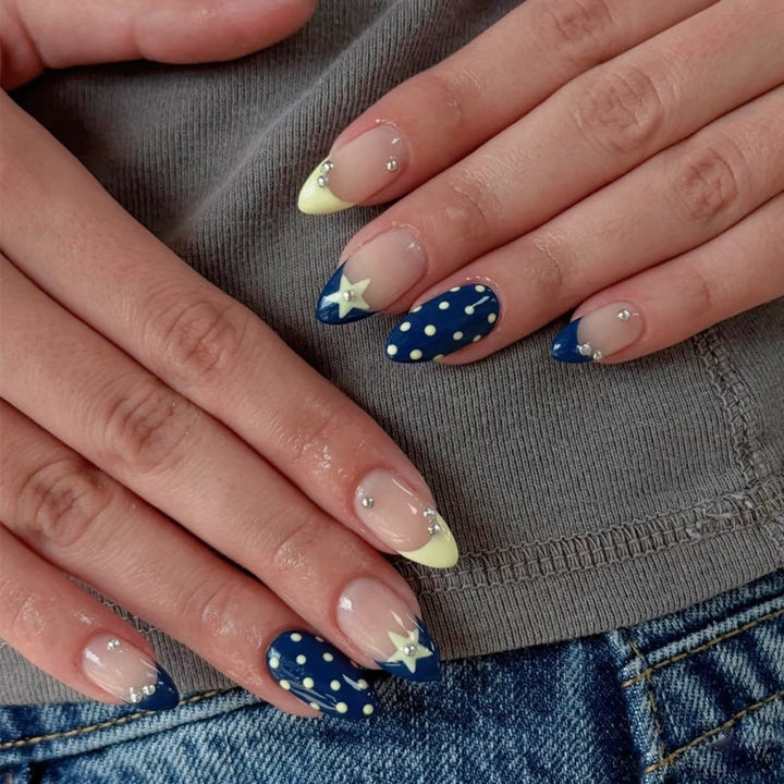 Artistic Nail Design with Star and Polka Dot Accents Stornfield