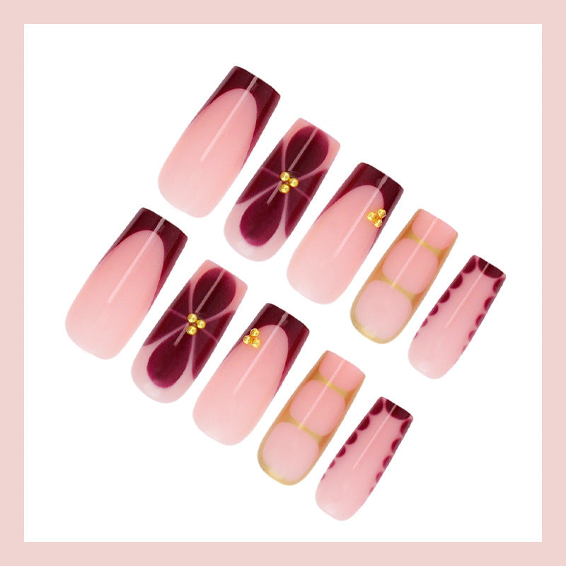 Artificial nail set with elegant gradient and delicate decorations Stornfield