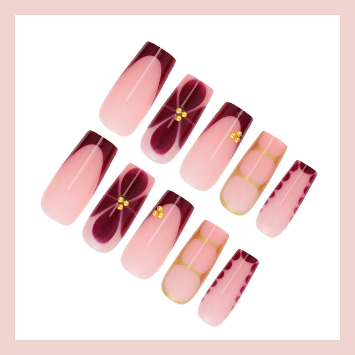 Artificial nail set with elegant gradient and delicate decorations Stornfield