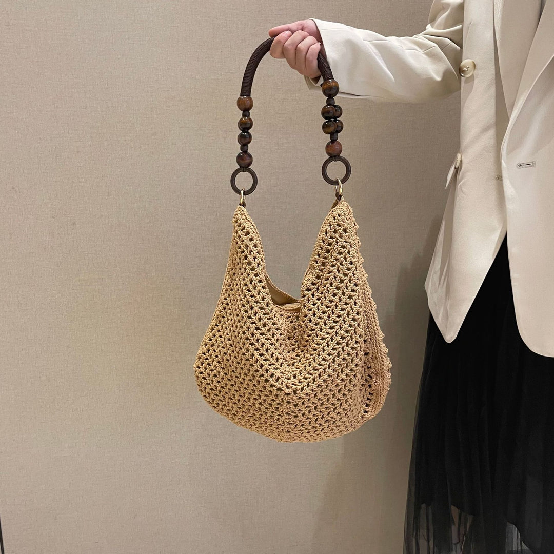 Hand-knotted bag with wooden handles Stornfield