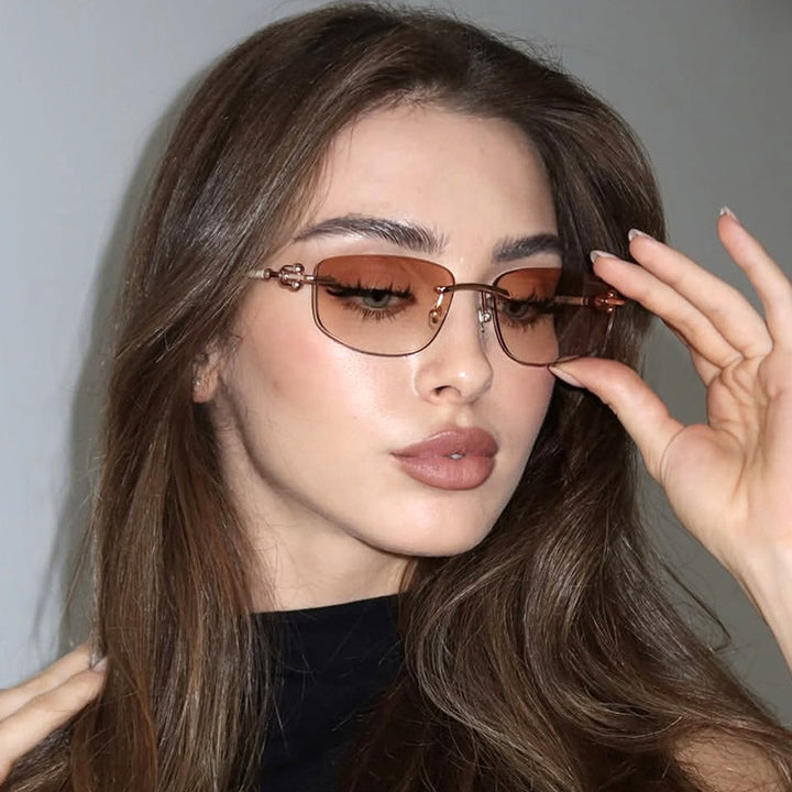 Ladies elegant semi-rimless glasses with luxurious metal frame and transparent lenses Stornfield