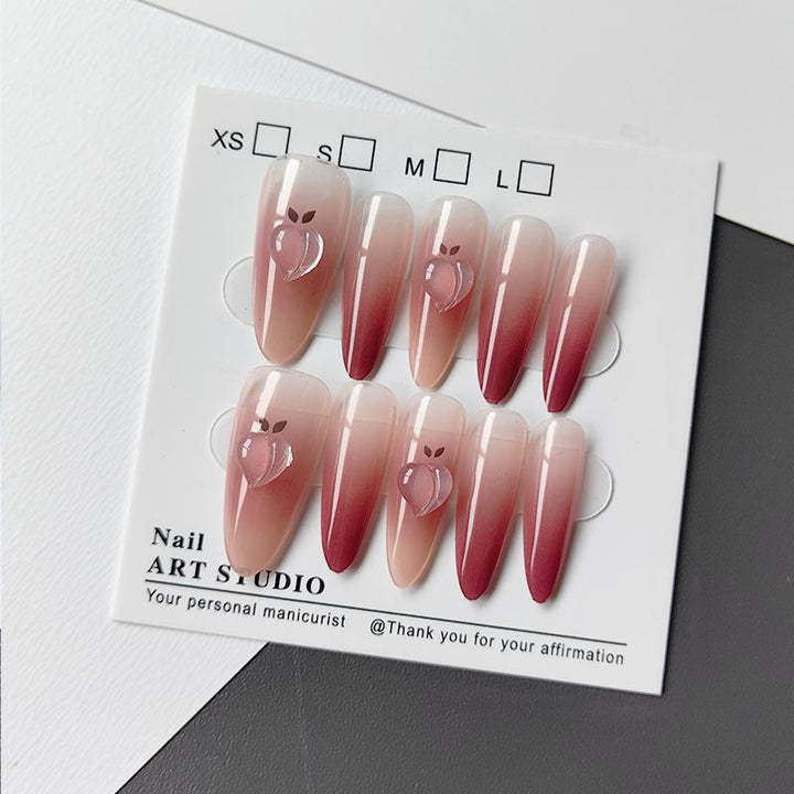 Artificial nails in elegant ombre design with fruit accents Stornfield