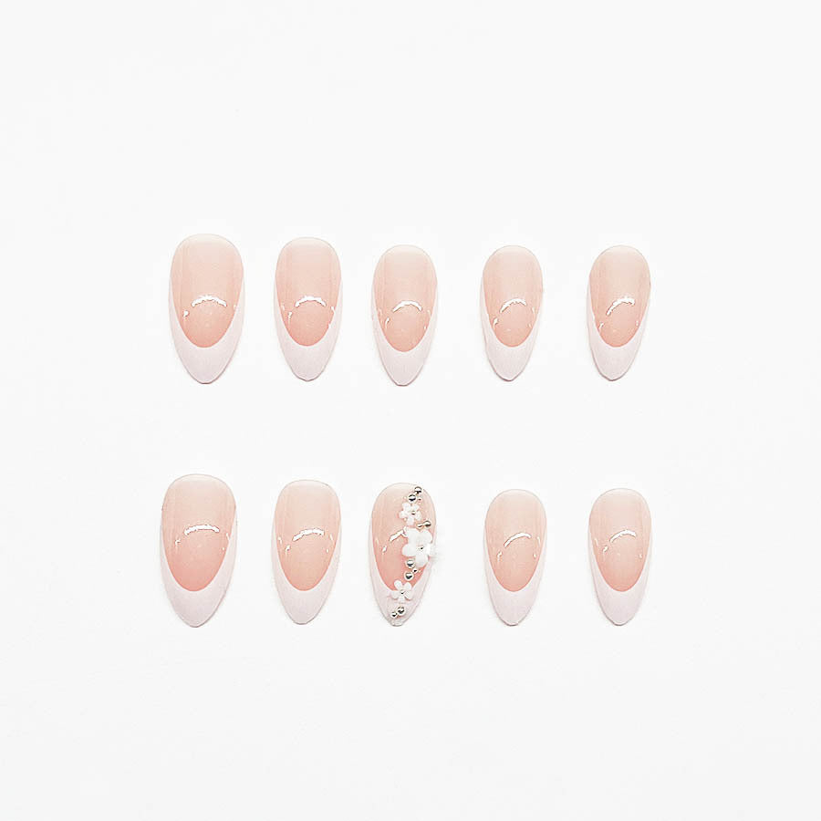 Acrylic Nail Set with Filigree Flower Decorations and Elegant French Design Stornfield