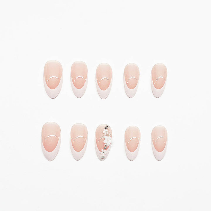 Acrylic Nail Set with Filigree Flower Decorations and Elegant French Design Stornfield