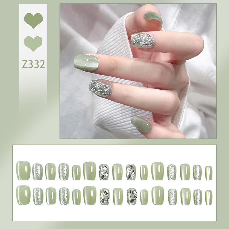 Acrylic nail set with elegant glitter design and creative effects Stornfield