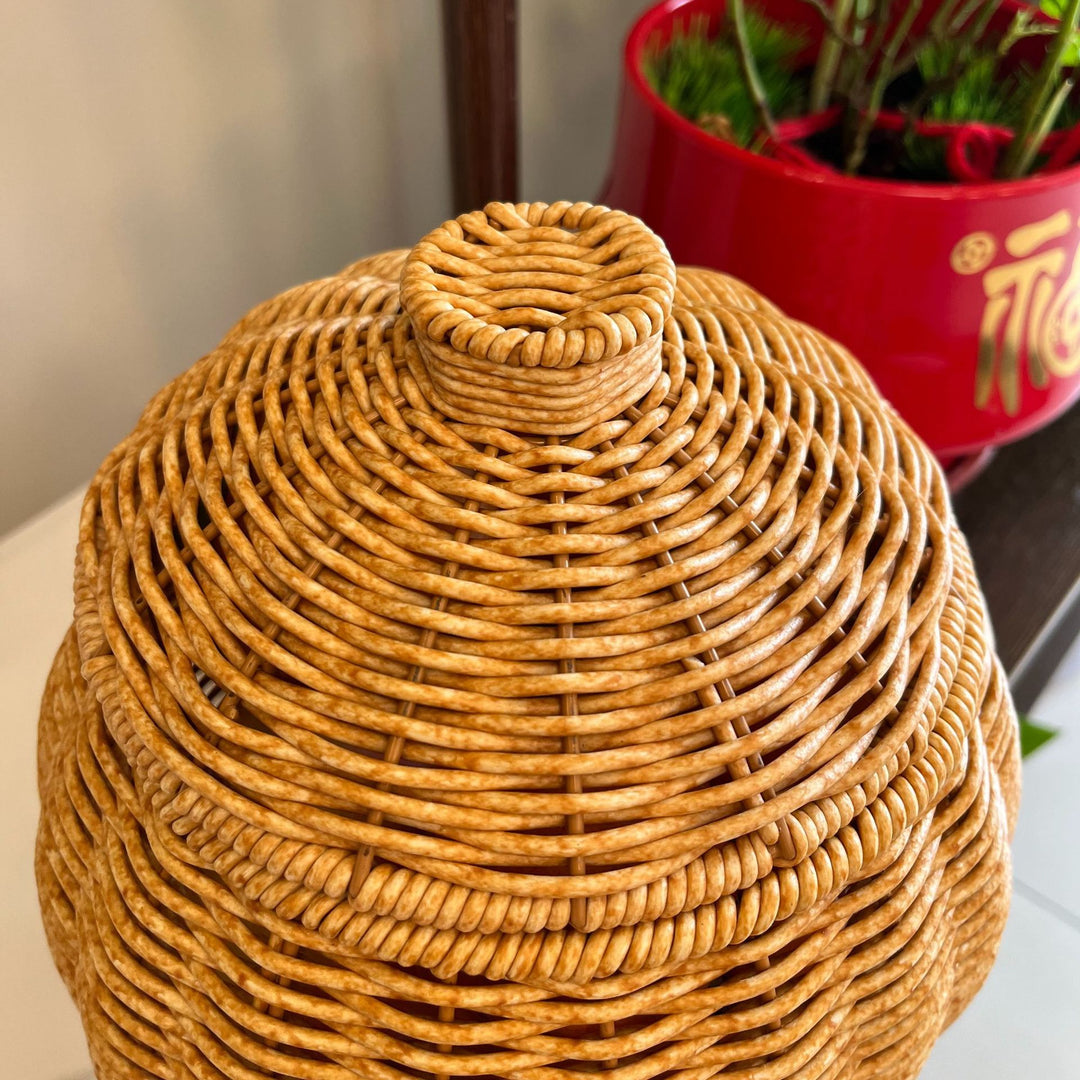 Women artfully woven storage pot Stornfield
