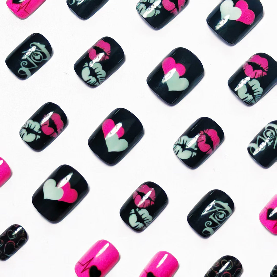 Acrylic nail design with hearts and kiss motifs Stornfield
