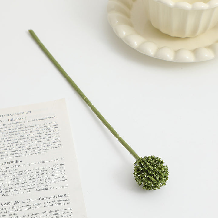 Artificial flower stem with detailed blooms