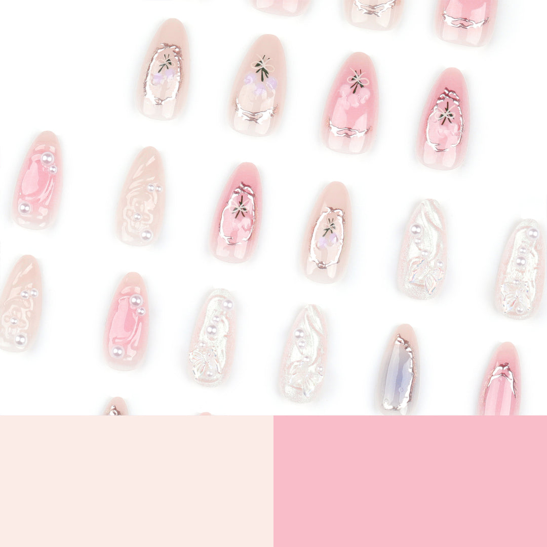 Artful nail extensions with elegant flower decoration Stornfield