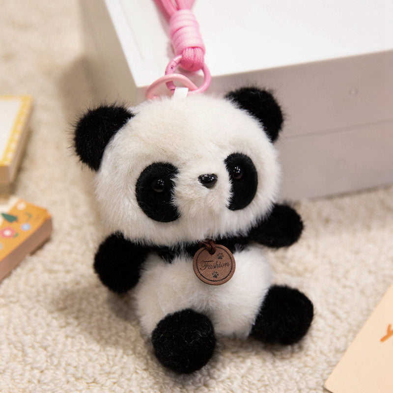 Plush Sitting Piglet Comforter Toy with Embroidered Paw Charm and Pendant Stornfield