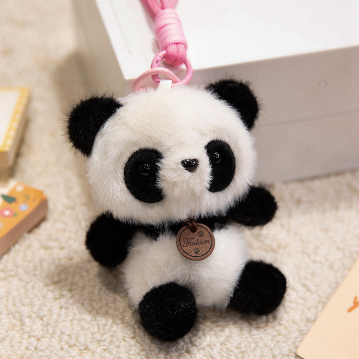 Plush Sitting Piglet Comforter Toy with Embroidered Paw Charm and Pendant Stornfield