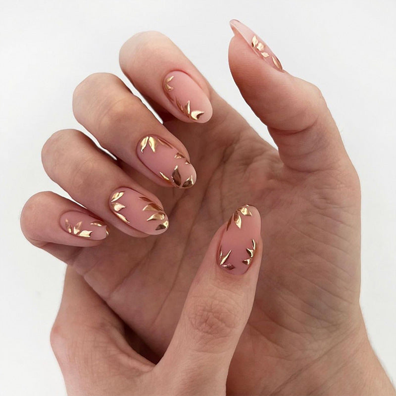 Elegant Gold Leaf Nail Art Stornfield