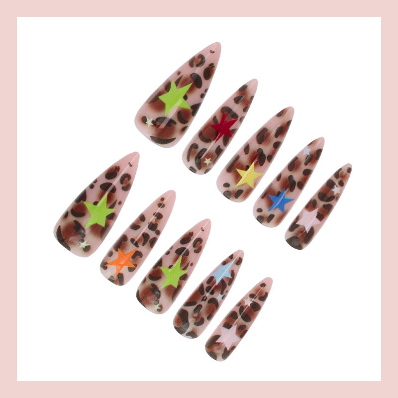 Acrylic nail set with animal pattern and colorful star accents Stornfield