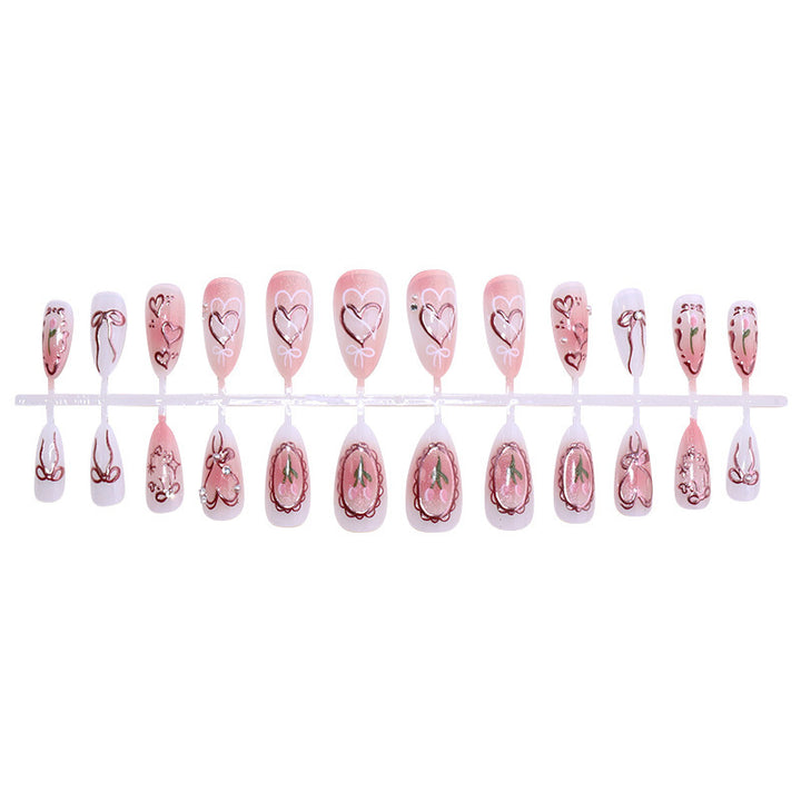 Artificial nail set with romantic hearts and bows design Stornfield