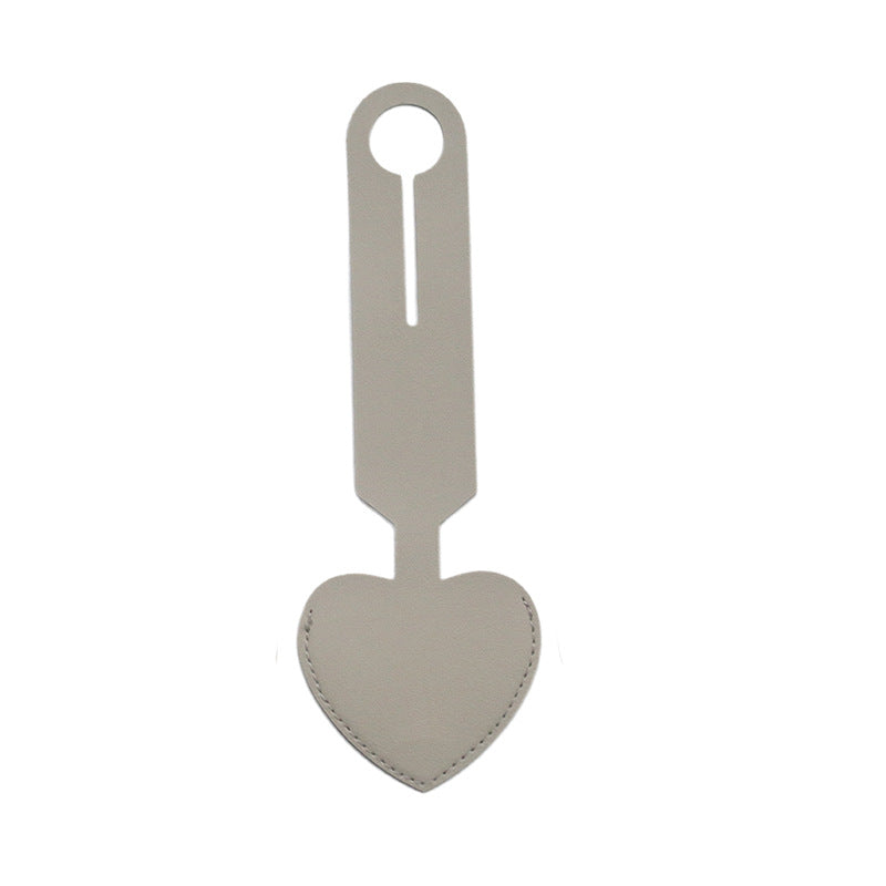 heart-shaped leather luggage tag with adjustable loop Stornfield