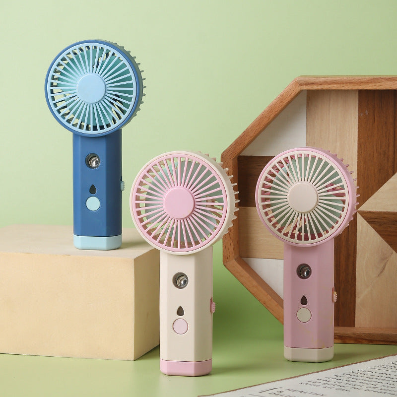 Cooling portable rechargeable handheld mini fan with adjustable airflow quiet motor and USB charging Stornfield