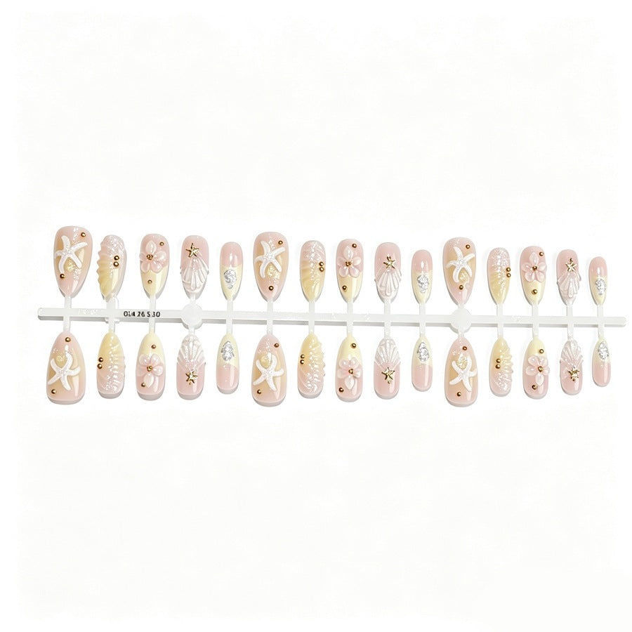 Artificial nail set with floral 3D elements and golden accents Stornfield