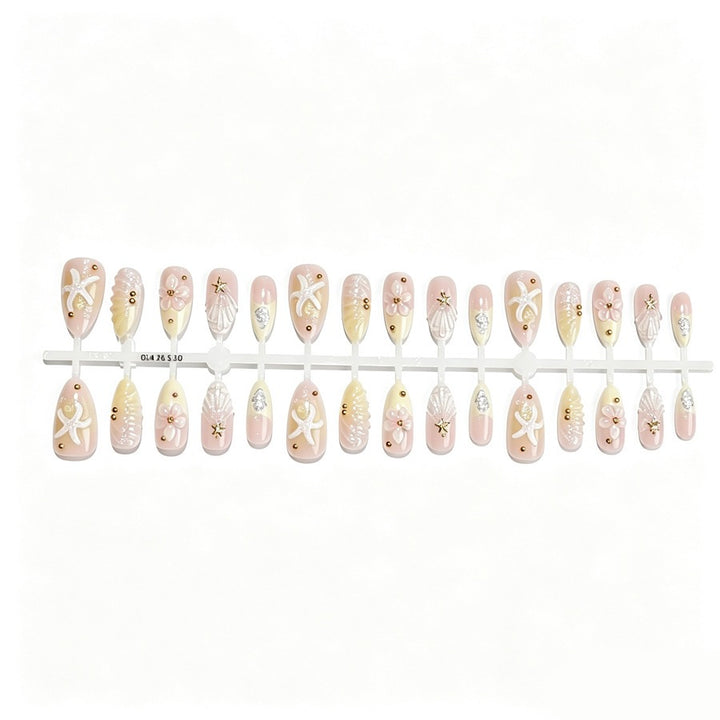 Artificial nail set with floral 3D elements and golden accents Stornfield