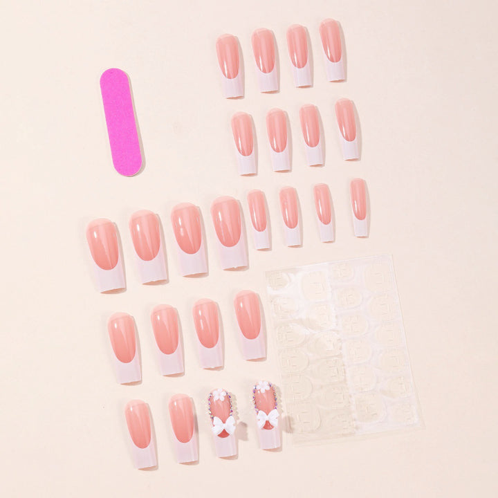 Artificial nail set with dreamy 3D flowers and bow decorations Stornfield