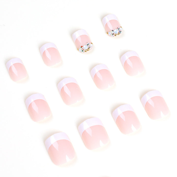 Artful Nail Extensions with Elegant Jewelry Accents Stornfield
