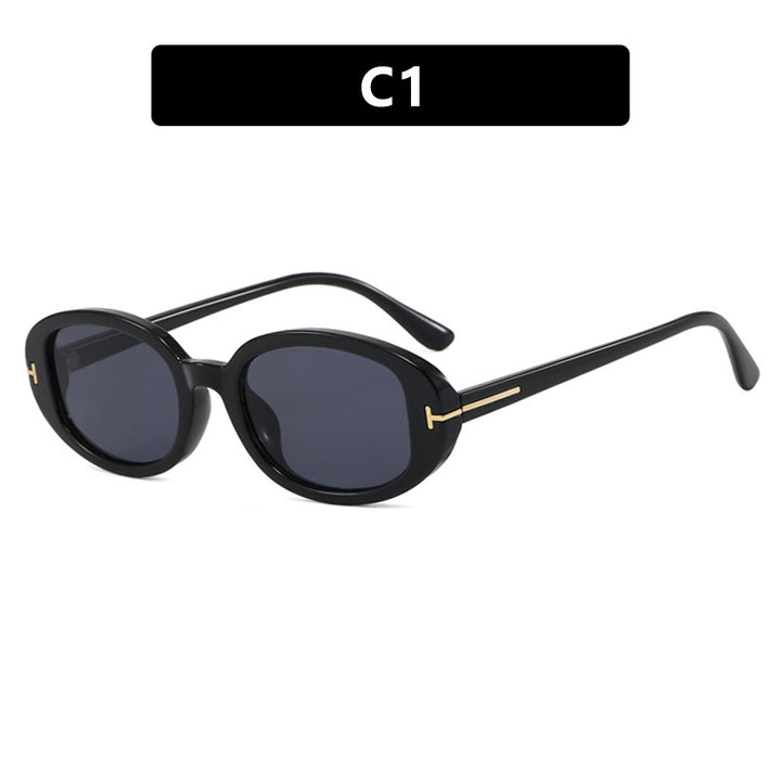 Ladies stylish oval sunglasses with golden details Stornfield