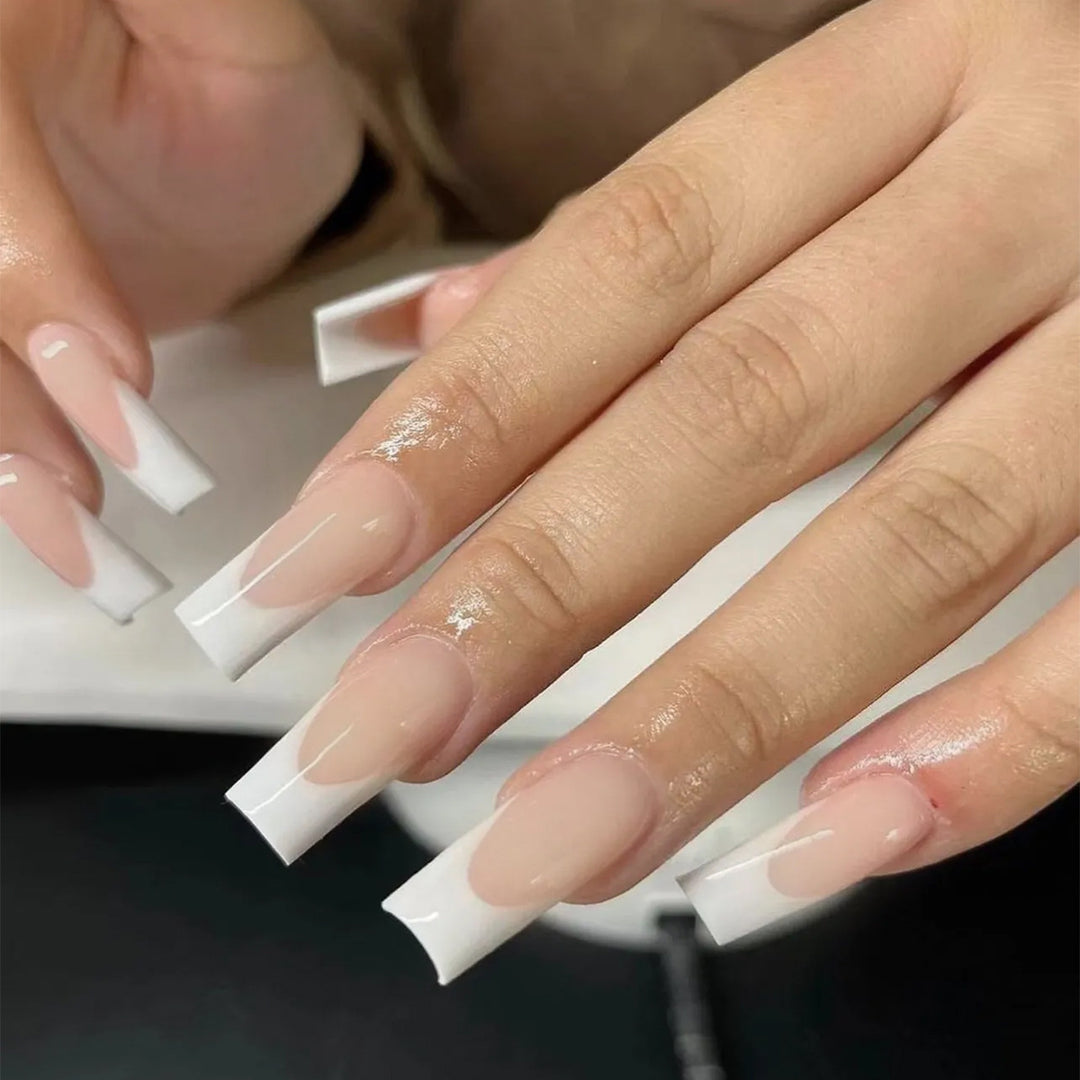 Artful nail extensions with elegant French tips Stornfield