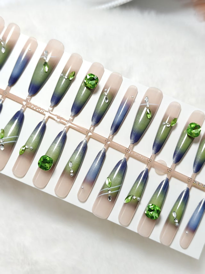 Artificial nails with elegant gradient color and glitter accents Stornfield