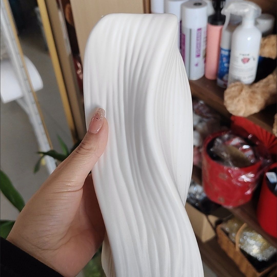 Artistic Wave-Patterned Decorative Sculpture Stornfeild
